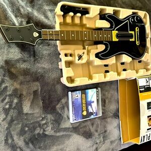Sony PS3 Guitar Hero. With game. Used but good condition.